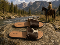 Myra Wild Dust Hair-on Leather Sliders - lifestyle shot by mountain river