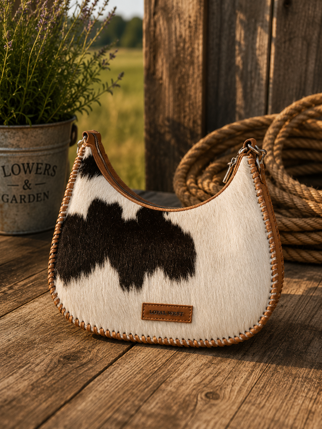 Loyal West Desert Desire large bag front view on rustic wooden surface showing Loyal West label