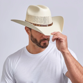 Man wearing the Austin straw cowboy hat