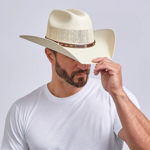 Man wearing the Austin straw cowboy hat