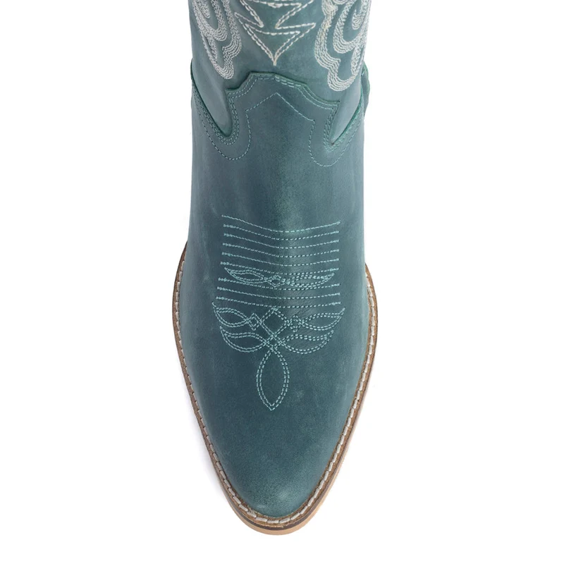 Close-up of the snip toe and embroidery on Nalejandra deep turquoise boots