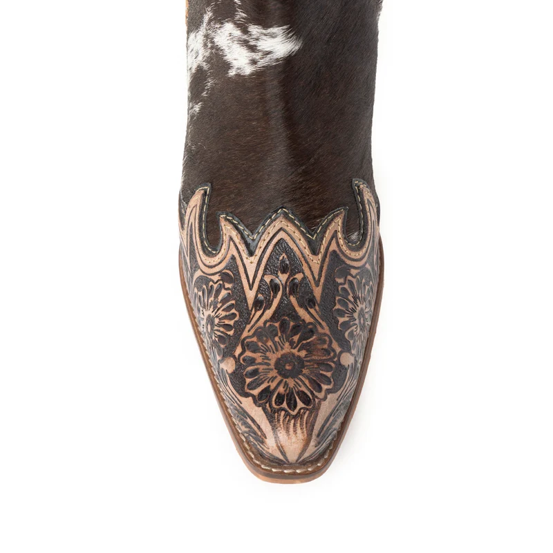 Close-up of the floral tooled leather toe on the Margie hair-on hide boot